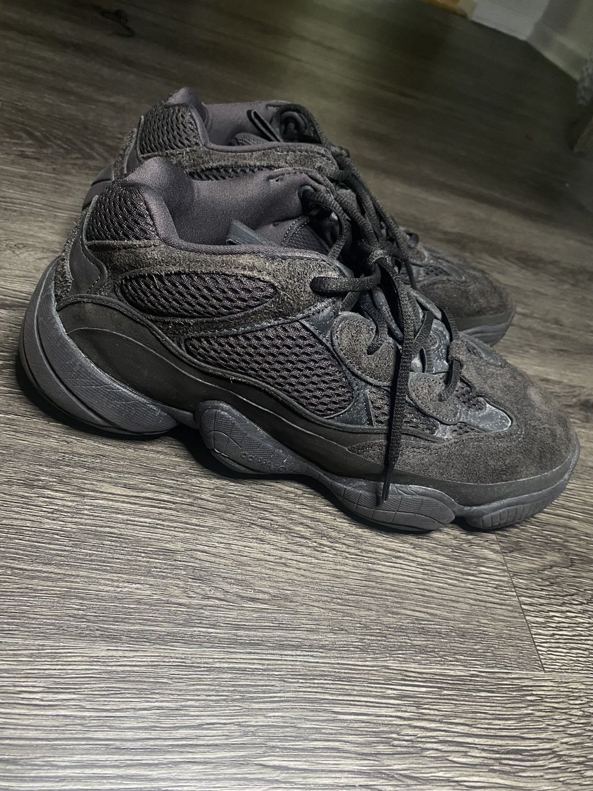 brown human race shoes