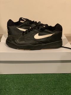 Nike shark best sale cleats 1992