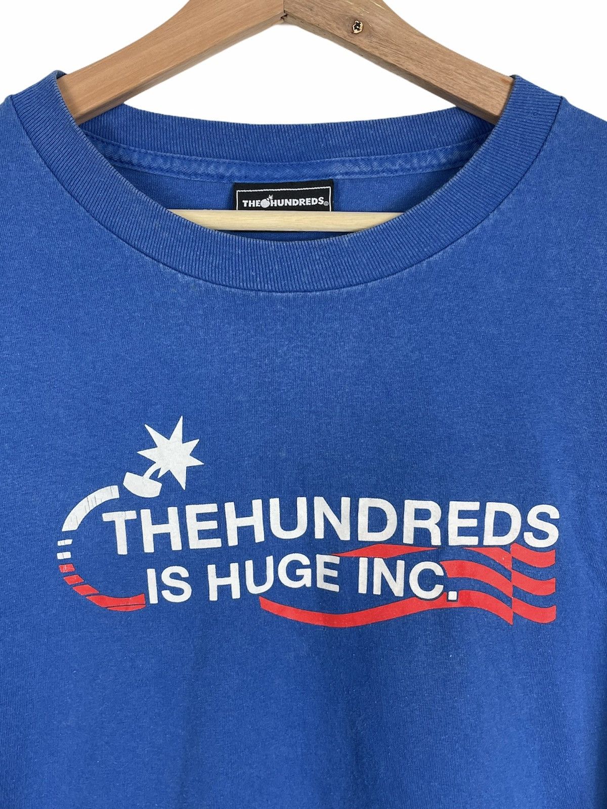 The Hundreds The Hundreds “Is Huge Inc.” Tee XL | Adam Bomb USA Size US XL / EU 56 / 4 - 7 Thumbnail