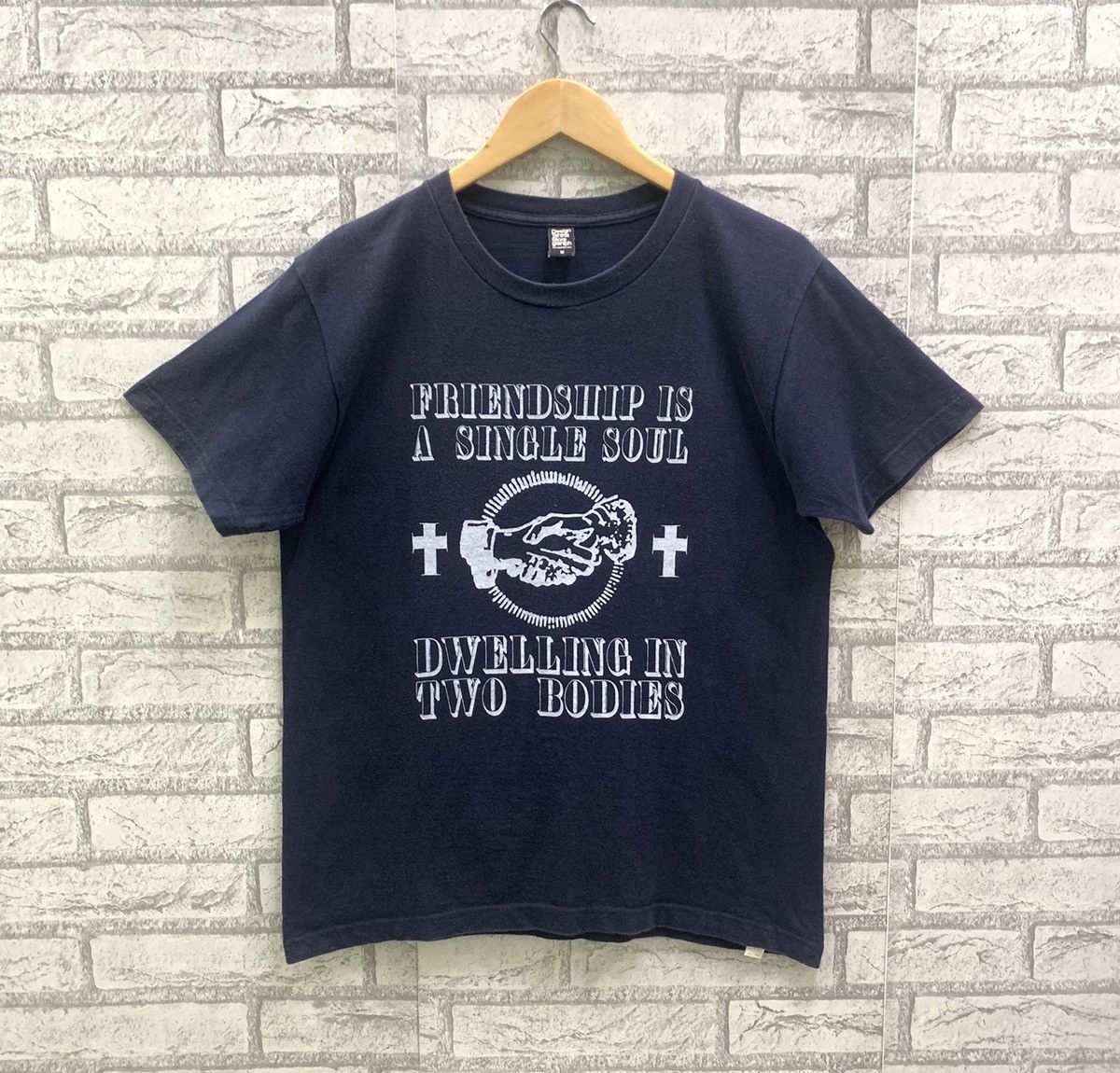 Friendship is a single soul dwelling in two bodies T-shirt