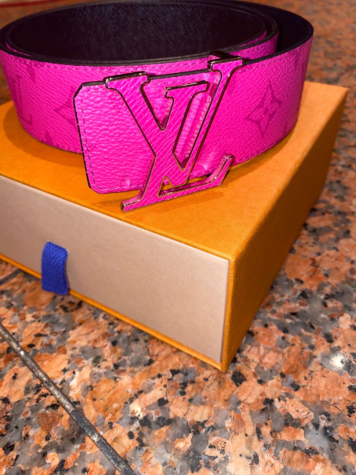 pink and brown louis vuittons belt