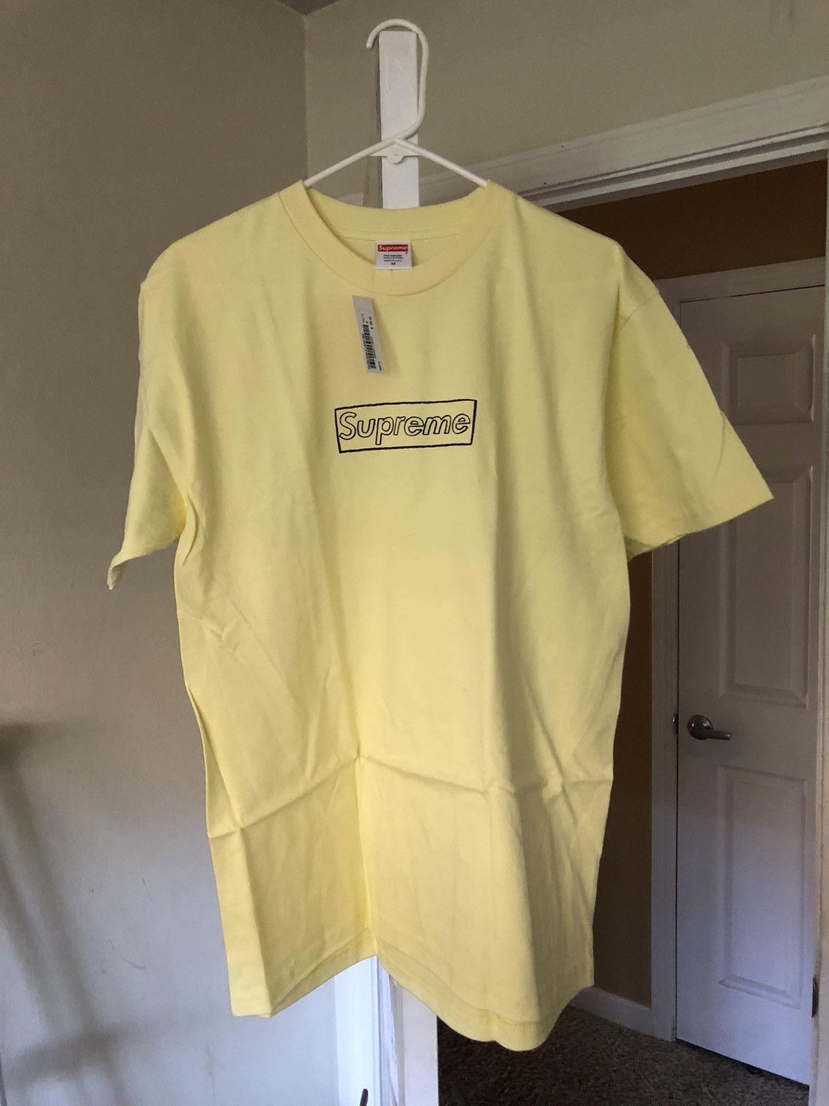 Kaws × Supreme Supreme KAWS Chalk Logo Tee Pale Yellow | Grailed 