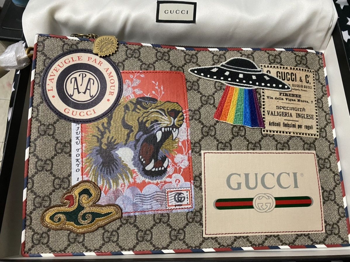 Gucci tiger clutch outlet