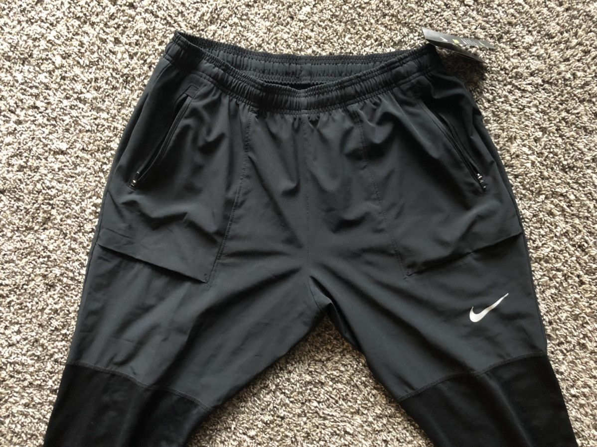 Nike Nike Men s Essential Hybrid Running Pants Black Grailed