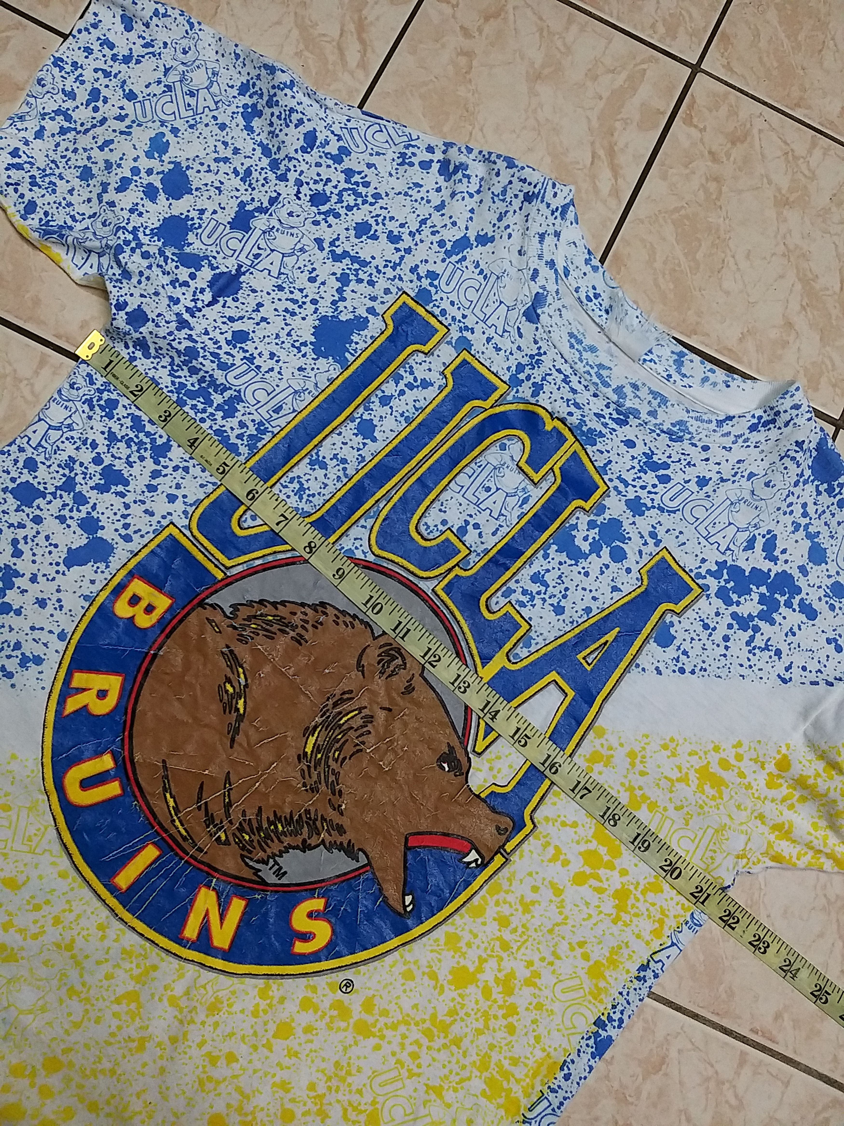 NBA RARE💥VINTAGE 80'S UCLA BRUINS NBA TEAM FULL PRINT T SHIRT Size US L / EU 52-54 / 3 - 7 Thumbnail