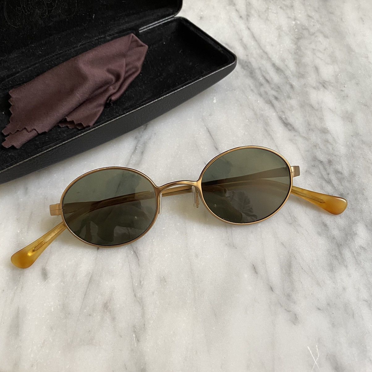 Oliver Peoples Coolidge Gold and Green Sunglasses Polarised