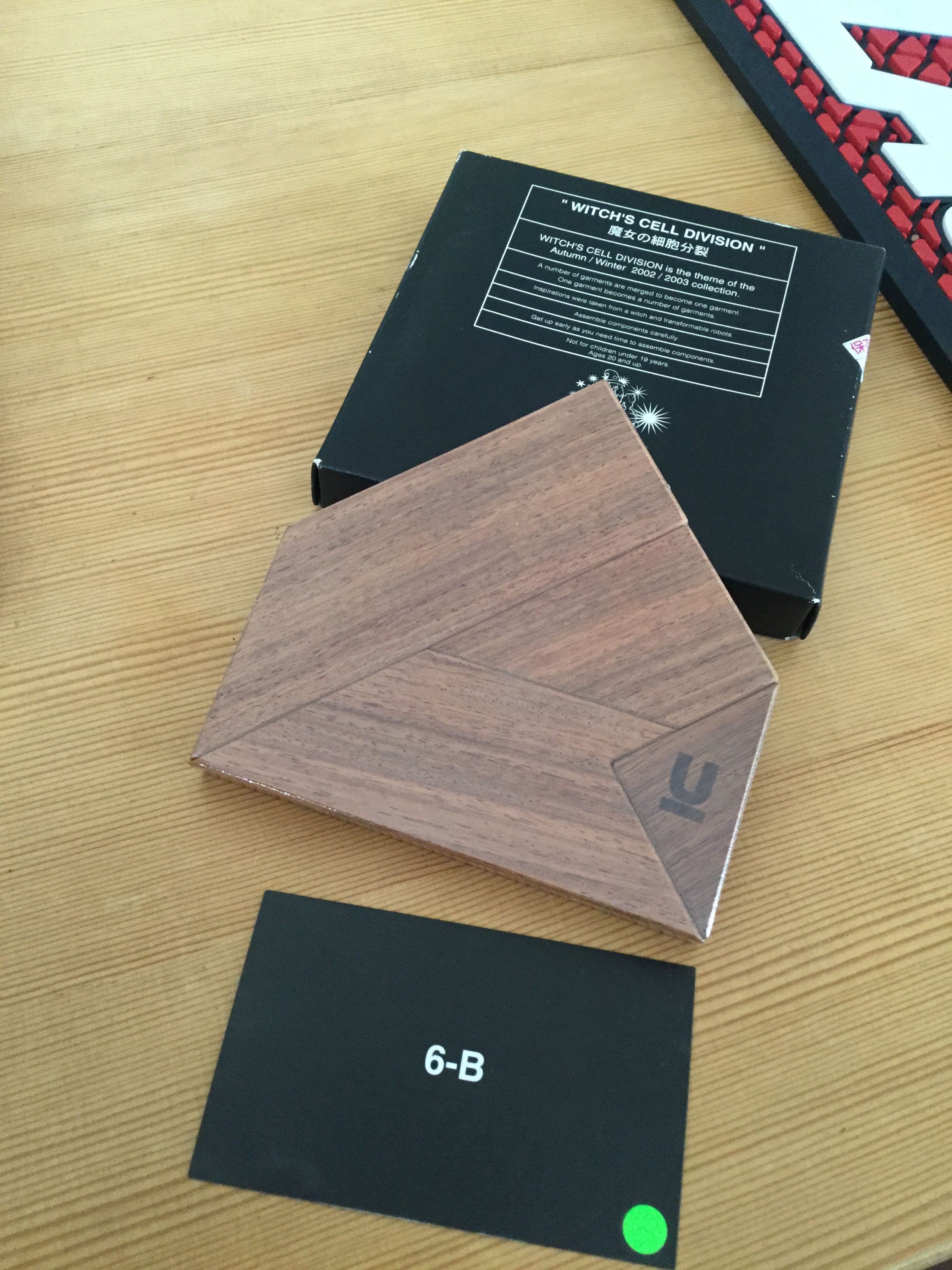 Undercover AW02 Witch's Cell Division Wooden Puzzle | Grailed