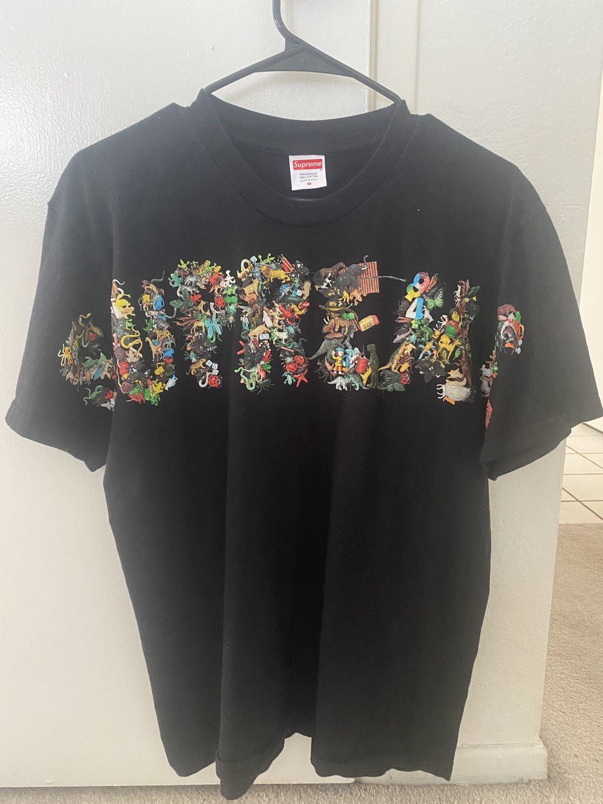 Supreme Supreme Toy Pile Tee Black | Grailed