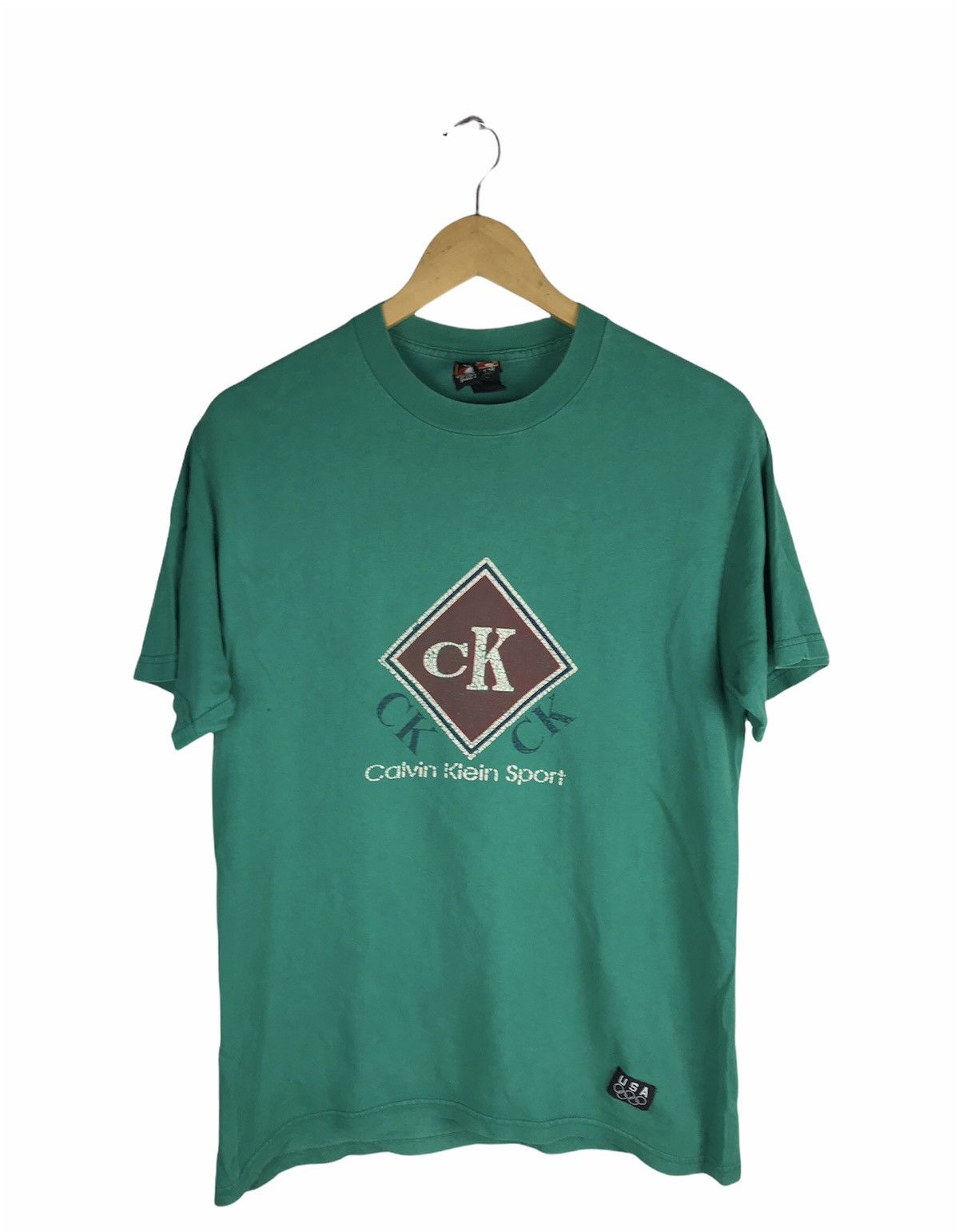 Calvin Klein × USA Olympics × Vintage Vintage 90s Calvin Klein Sport T-Shirt - Green Made in USA Size US M / EU 48-50 / 2 - 1 Thumbnail