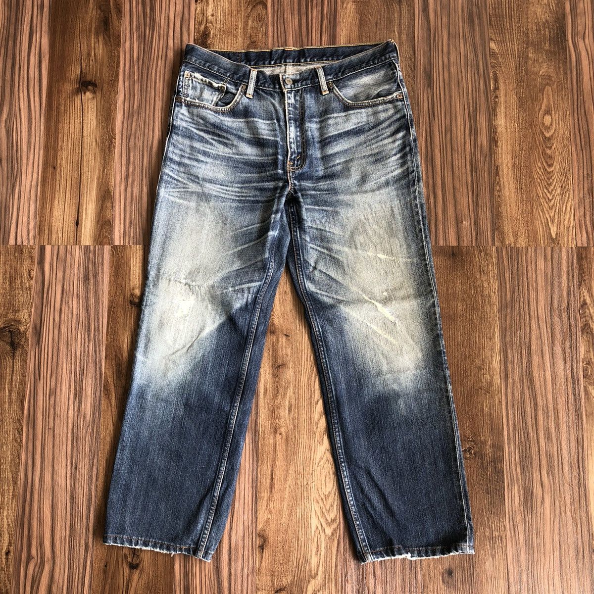 Vintage Levis 702 Distressed Denim Jeans