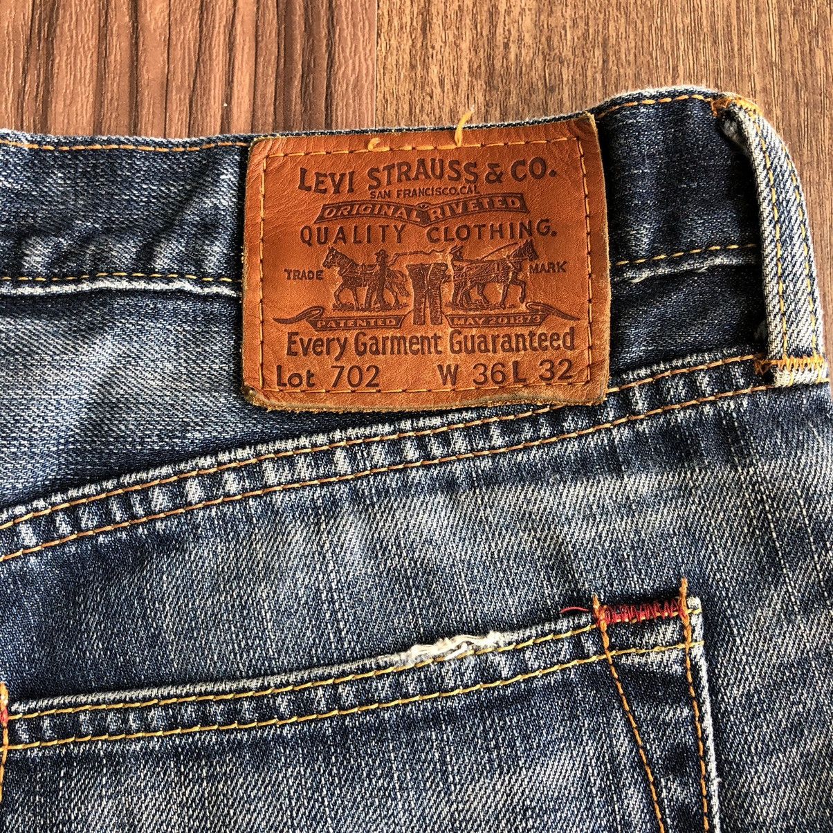 Vintage Levis 702 Distressed Denim Jeans