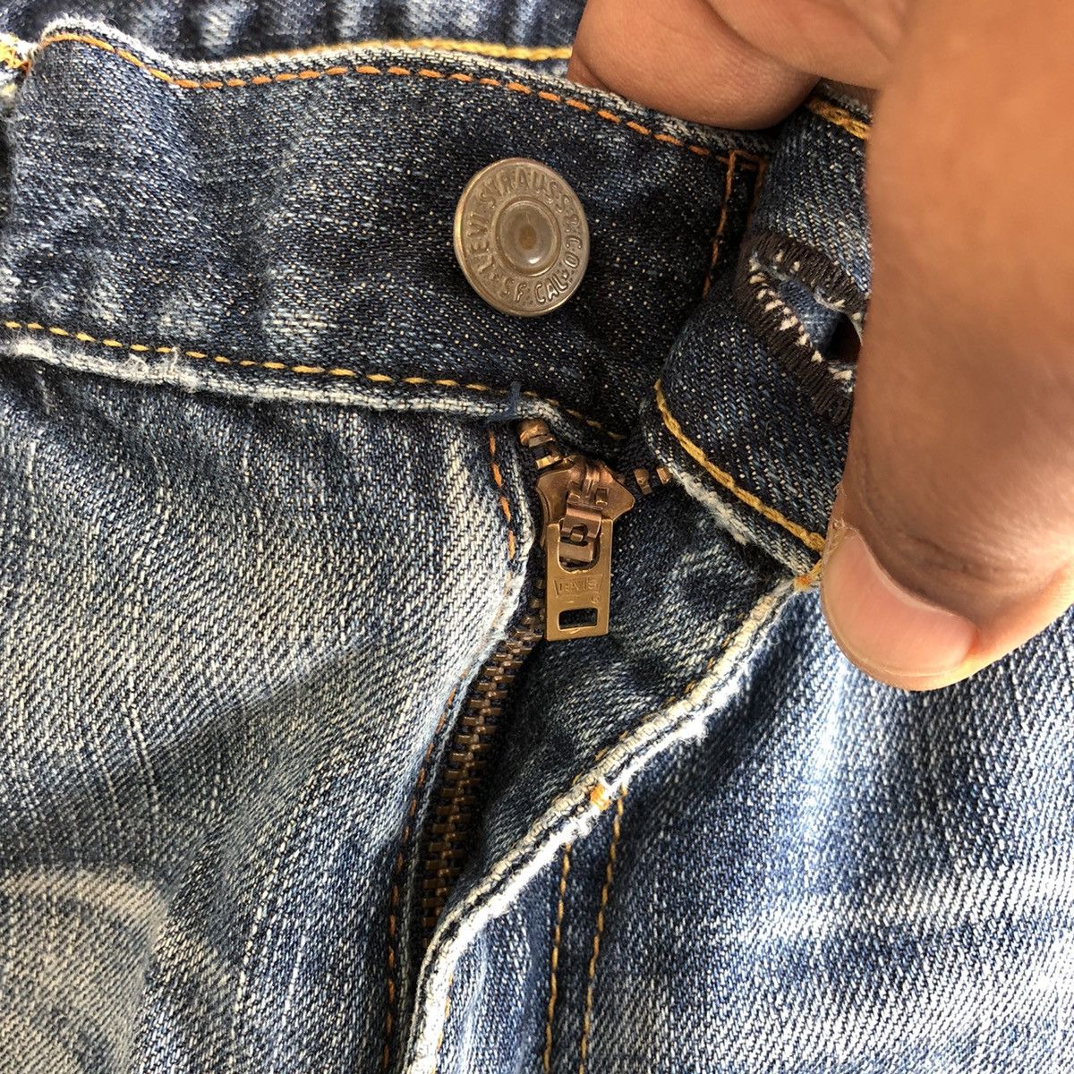 Vintage Levis 702 Distressed Denim Jeans