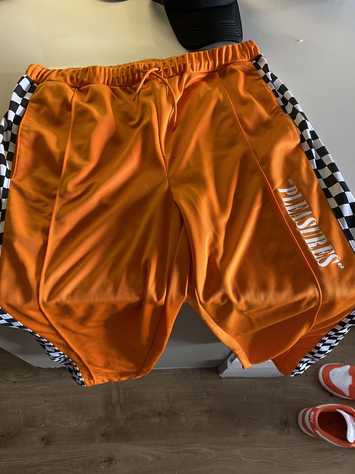 PLEASURES Checkered Track Pants - Orange
