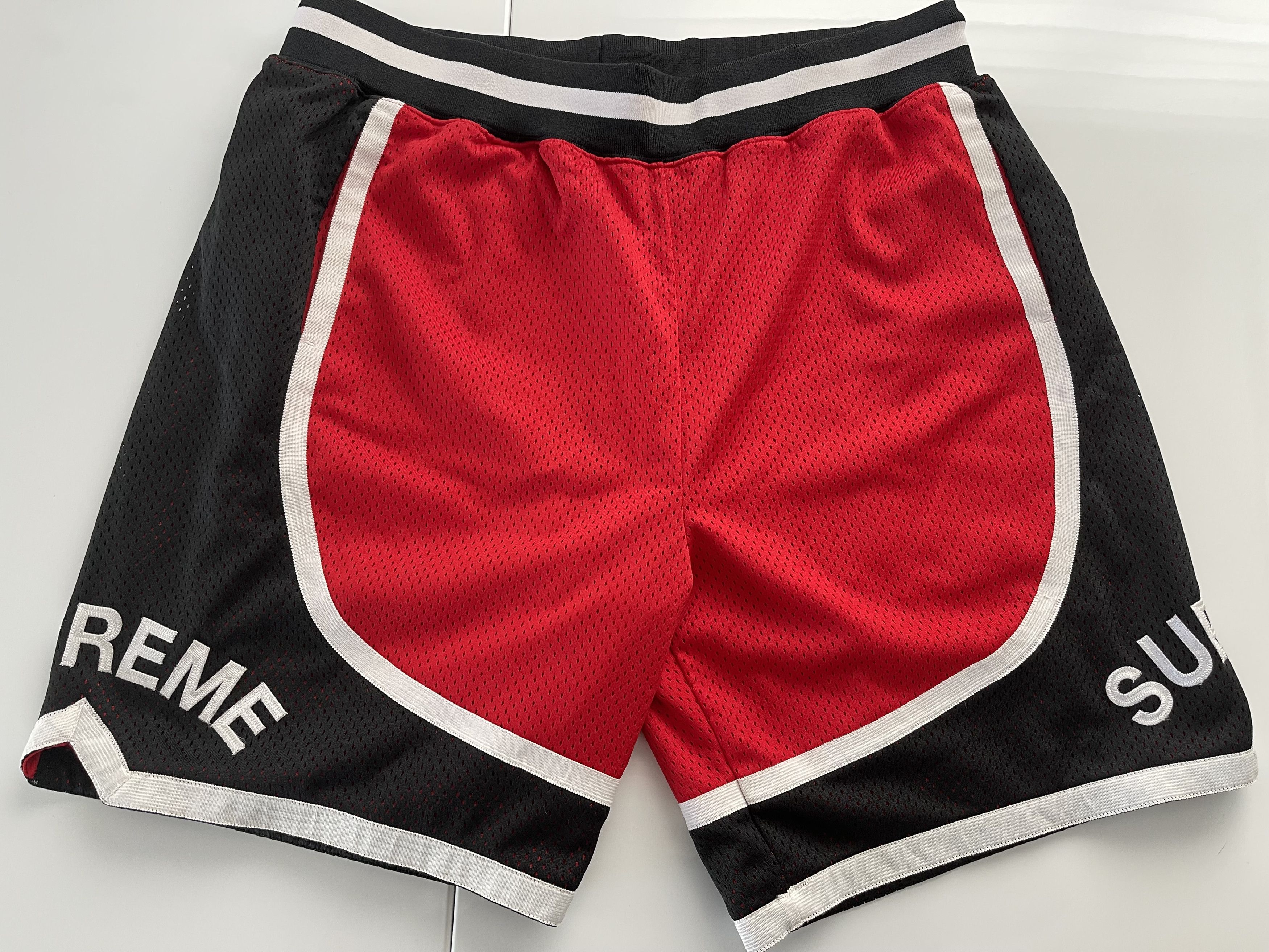 Supreme best sale red shorts