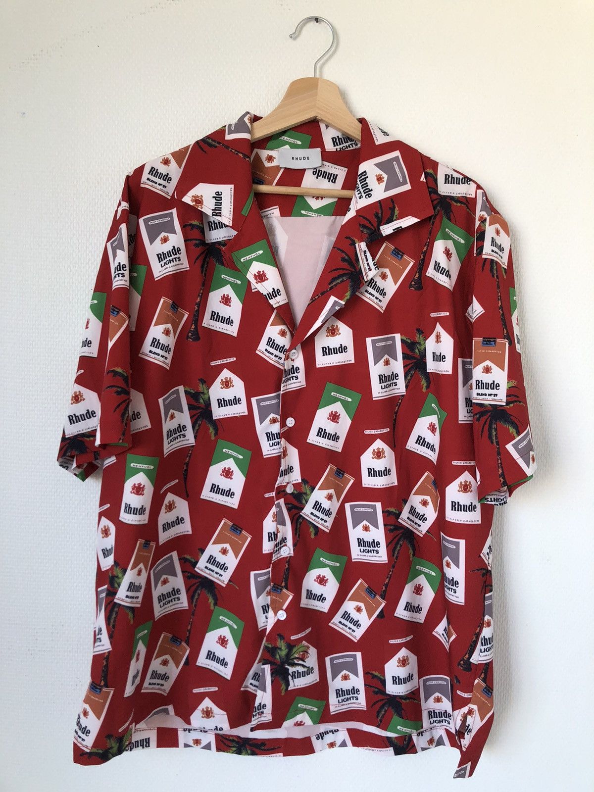 rhude cigarette shirt button up shirt, size medium but fits This stylish shirt combines functionality with modern design elements Rhude Cigarette SS Shirt. Size