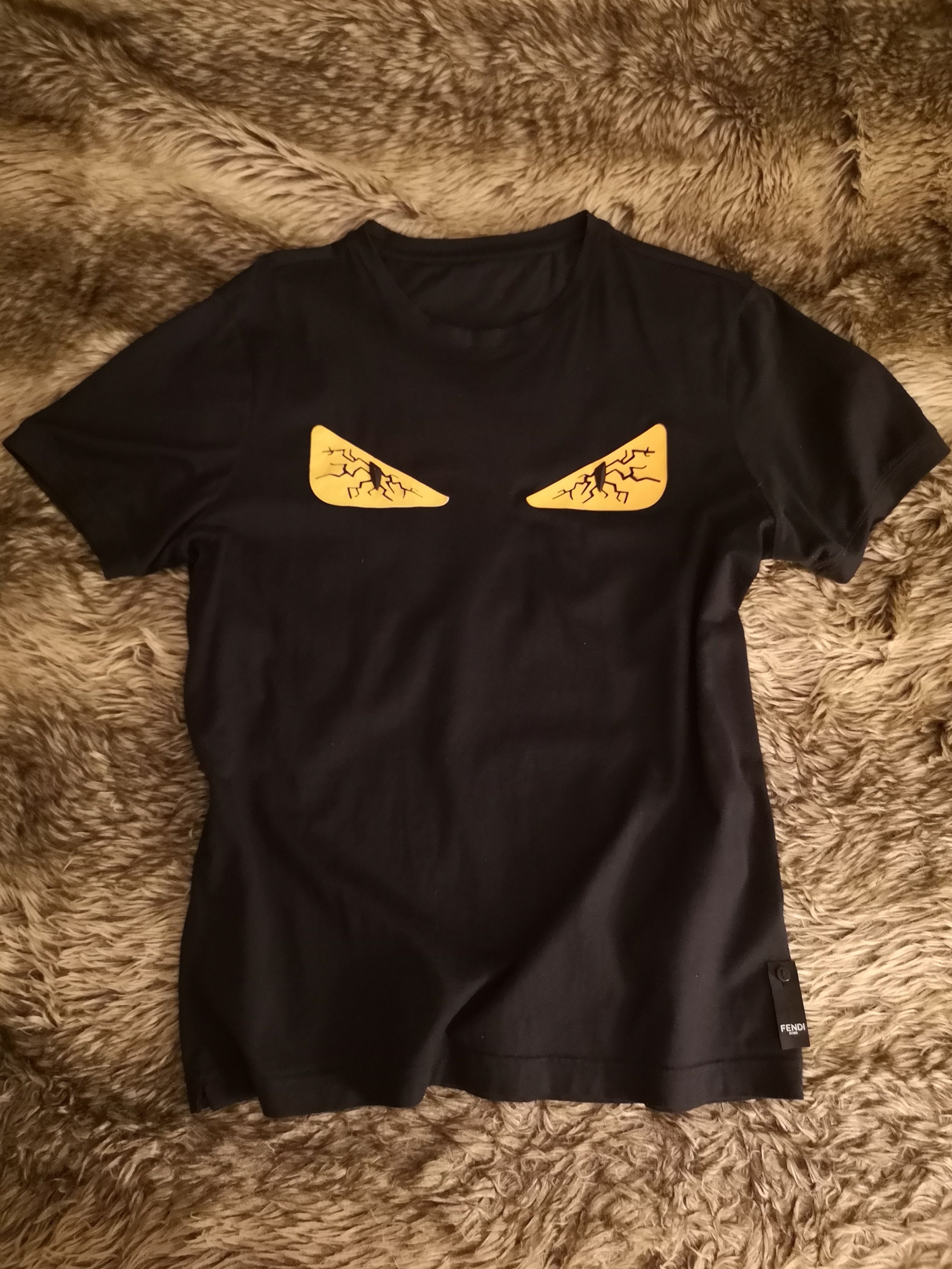 Fendi tired eyes t shirt best sale