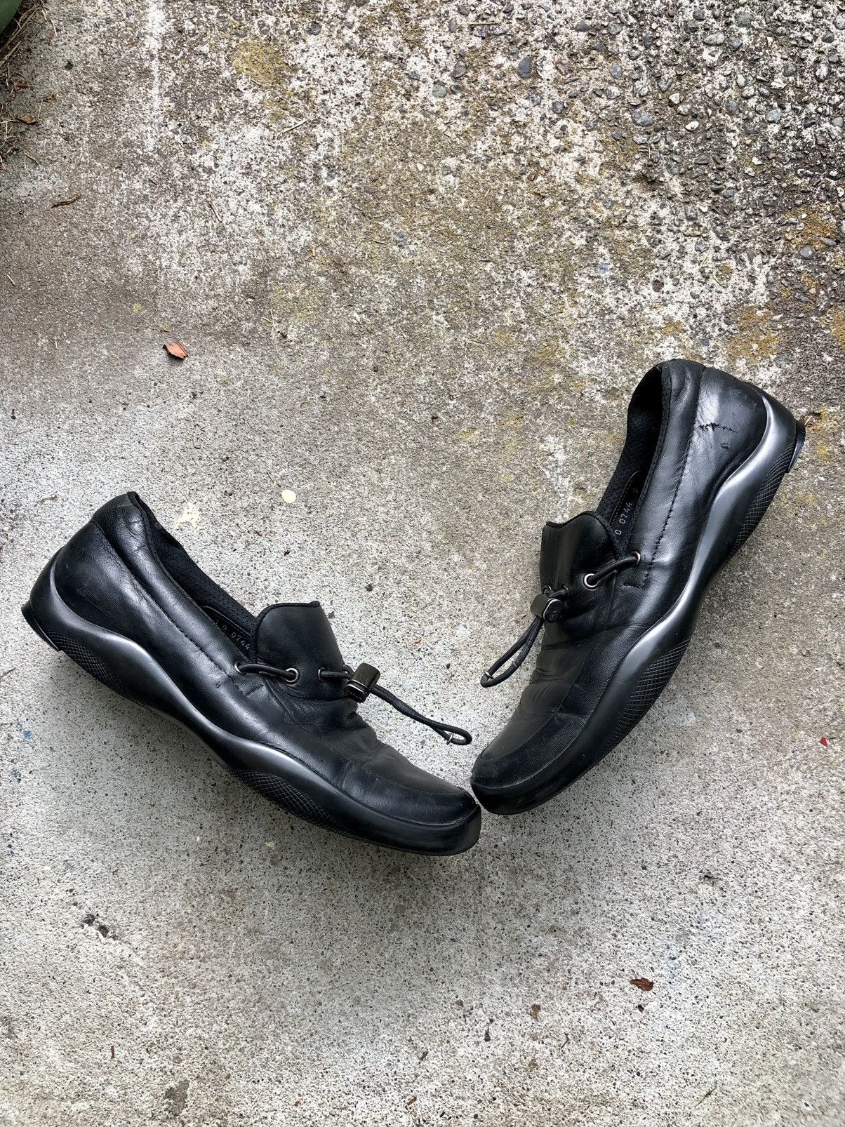 Prada Prada leather slip on with drawstring loafers | Grailed