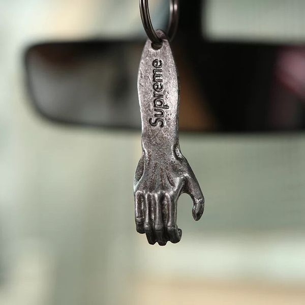 Supreme hand clearance bottle opener