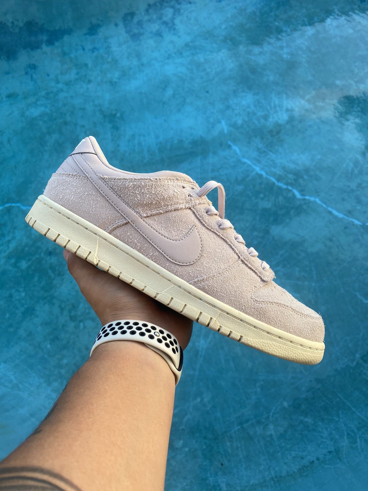 tan and red nike shoes