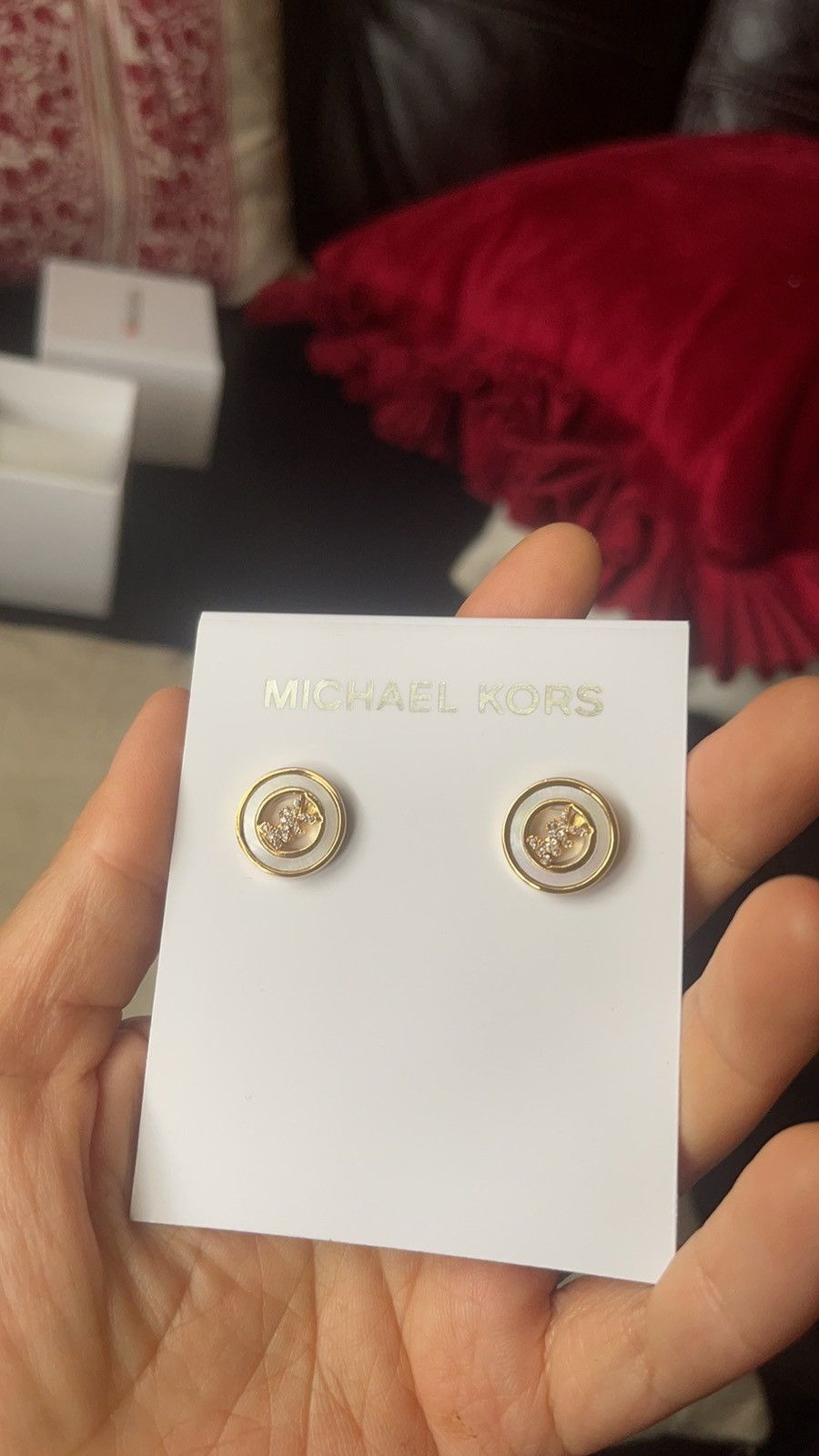 Michael Kors earrings in yellow gold