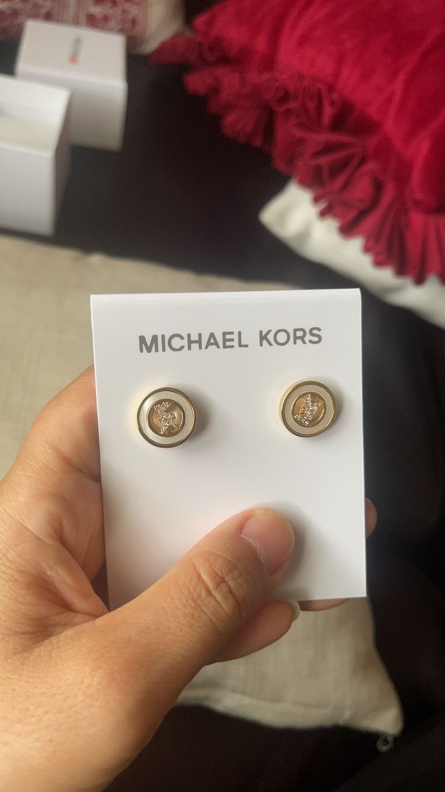 Michael Kors earrings in yellow gold