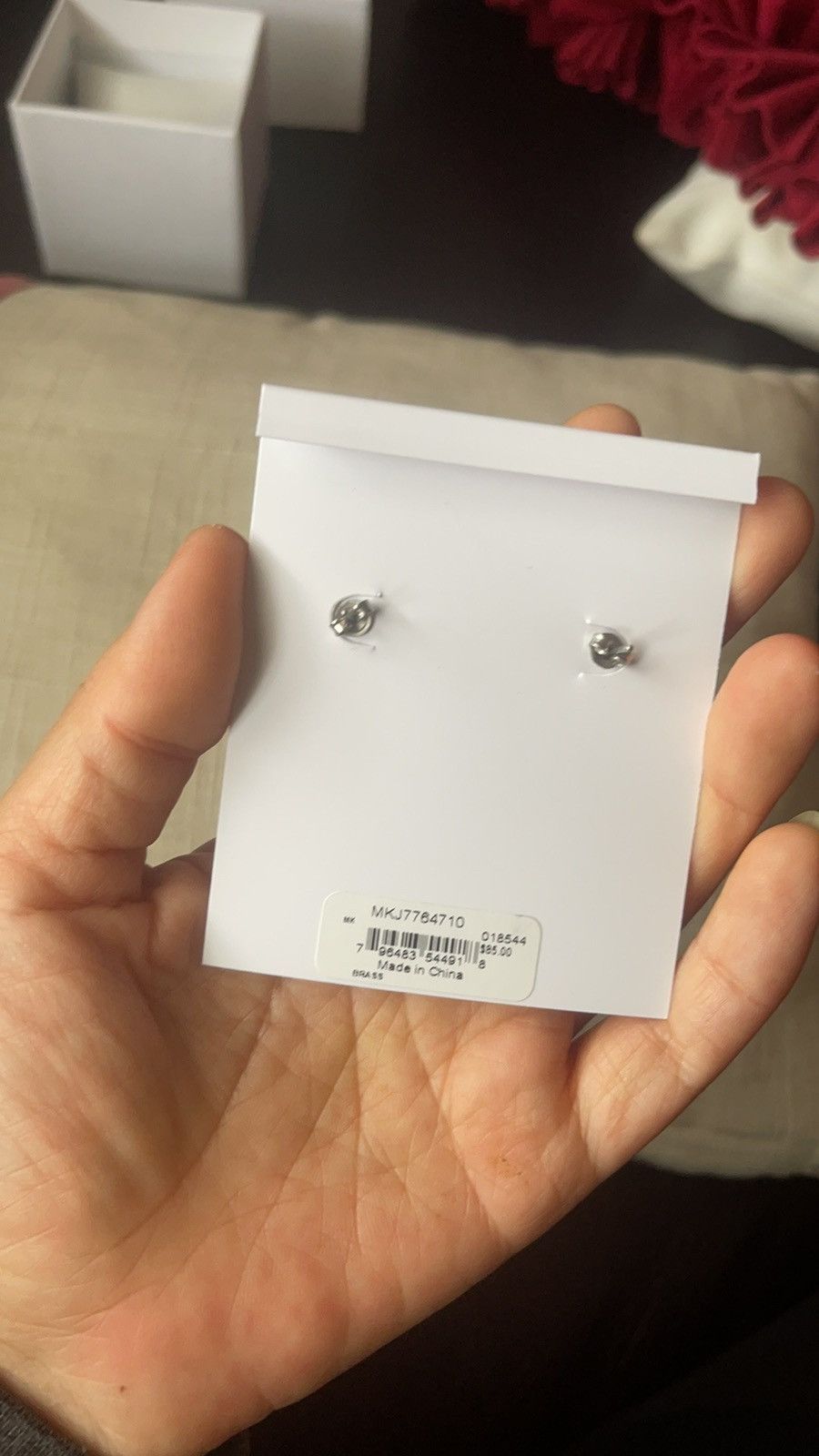Michael Kors earrings in yellow gold