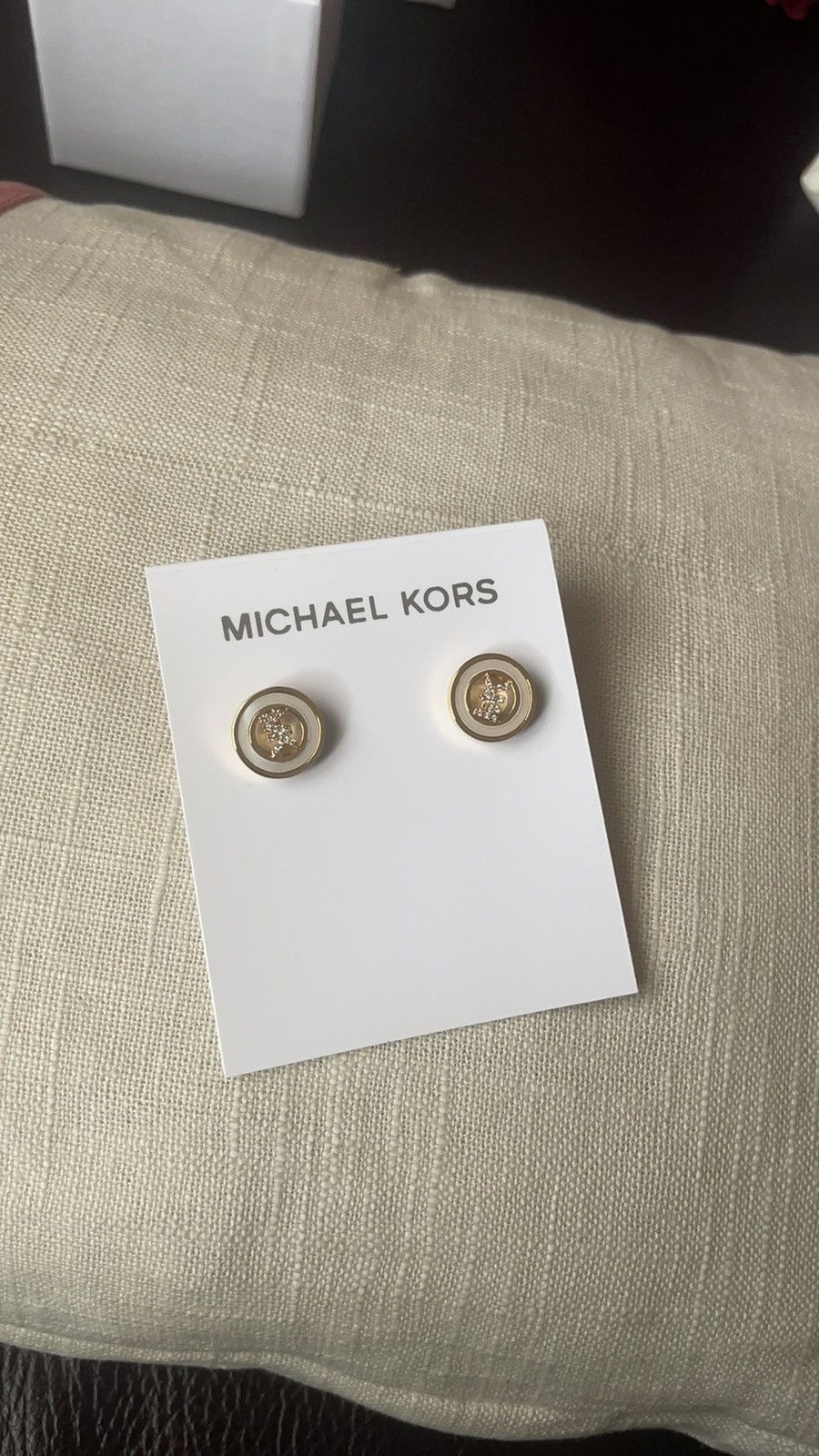 Michael Kors earrings in yellow gold