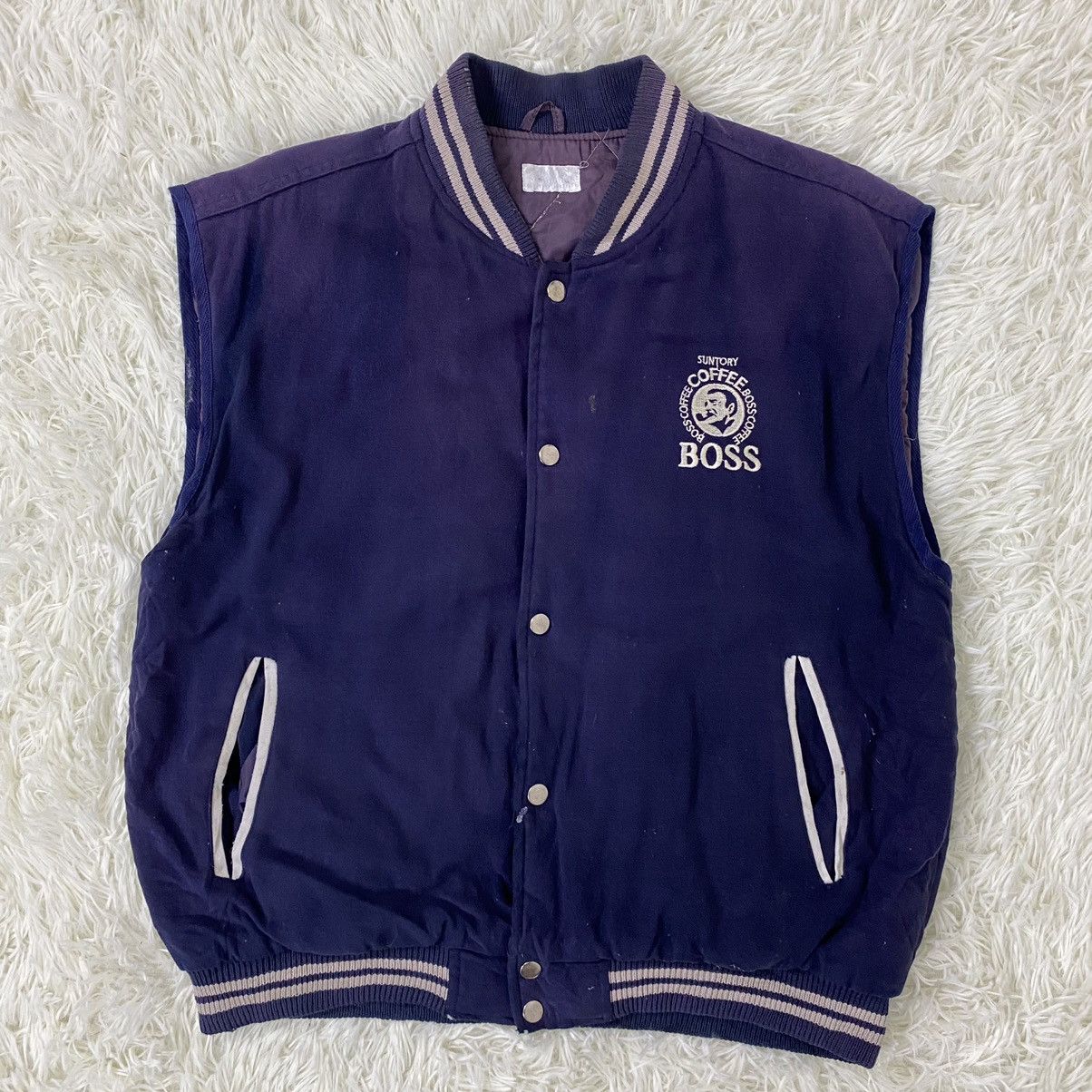 SUN FADED SUNTORY BOSS COFFEE VARSITY SLEEVE LESS JACKET