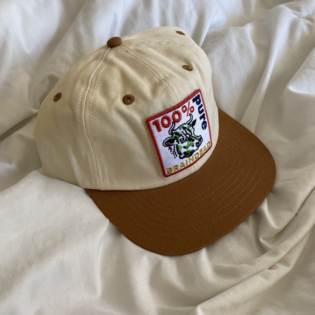 BRAINDEAD BRAINDEAD “PURE COW” 6 PANEL CAP - CREAM