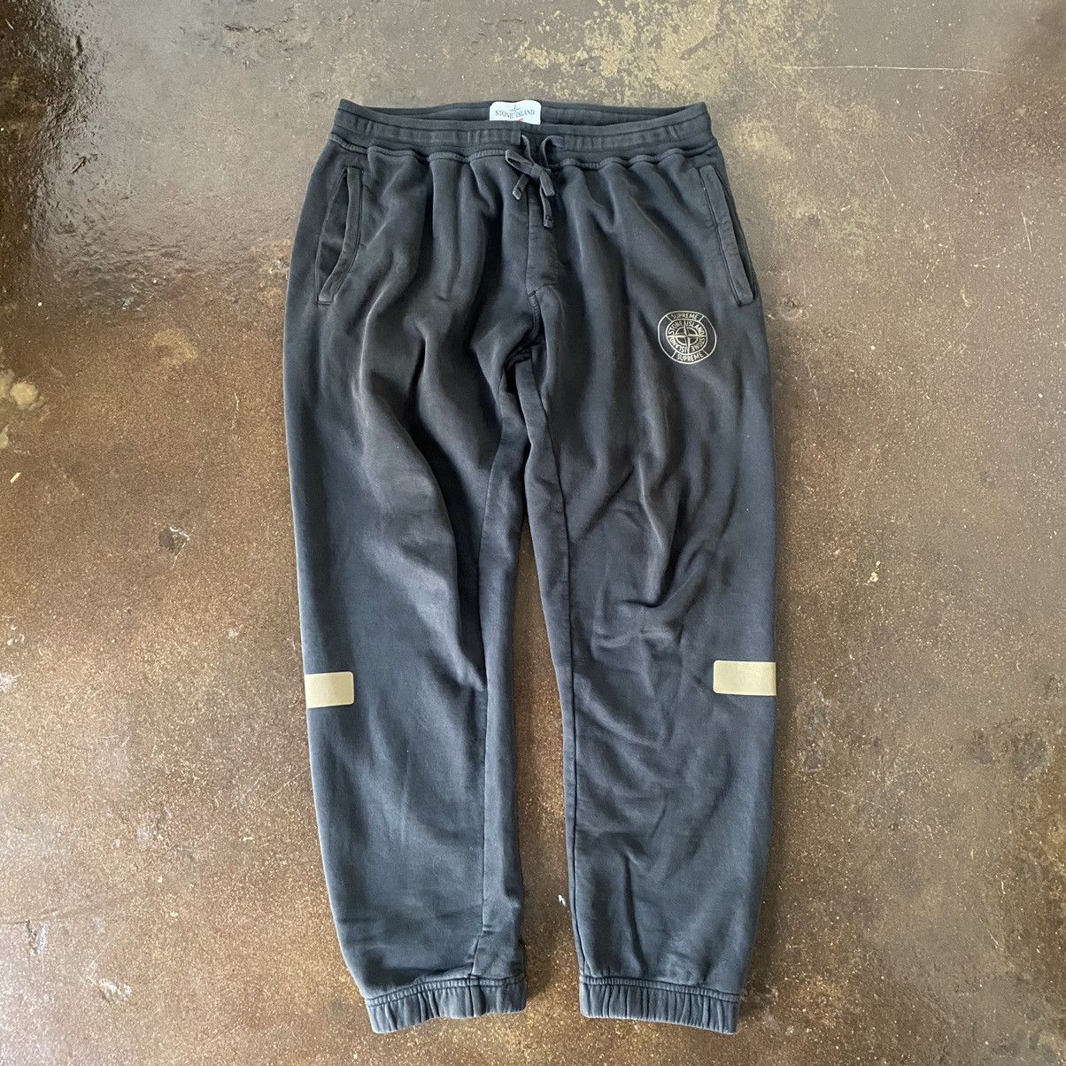 Supreme stone island track pants discount