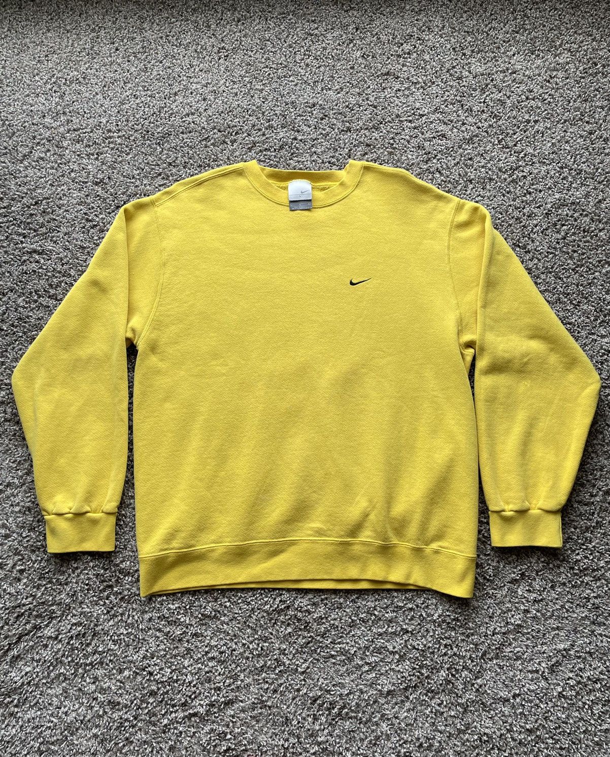 white nike yellow swoosh