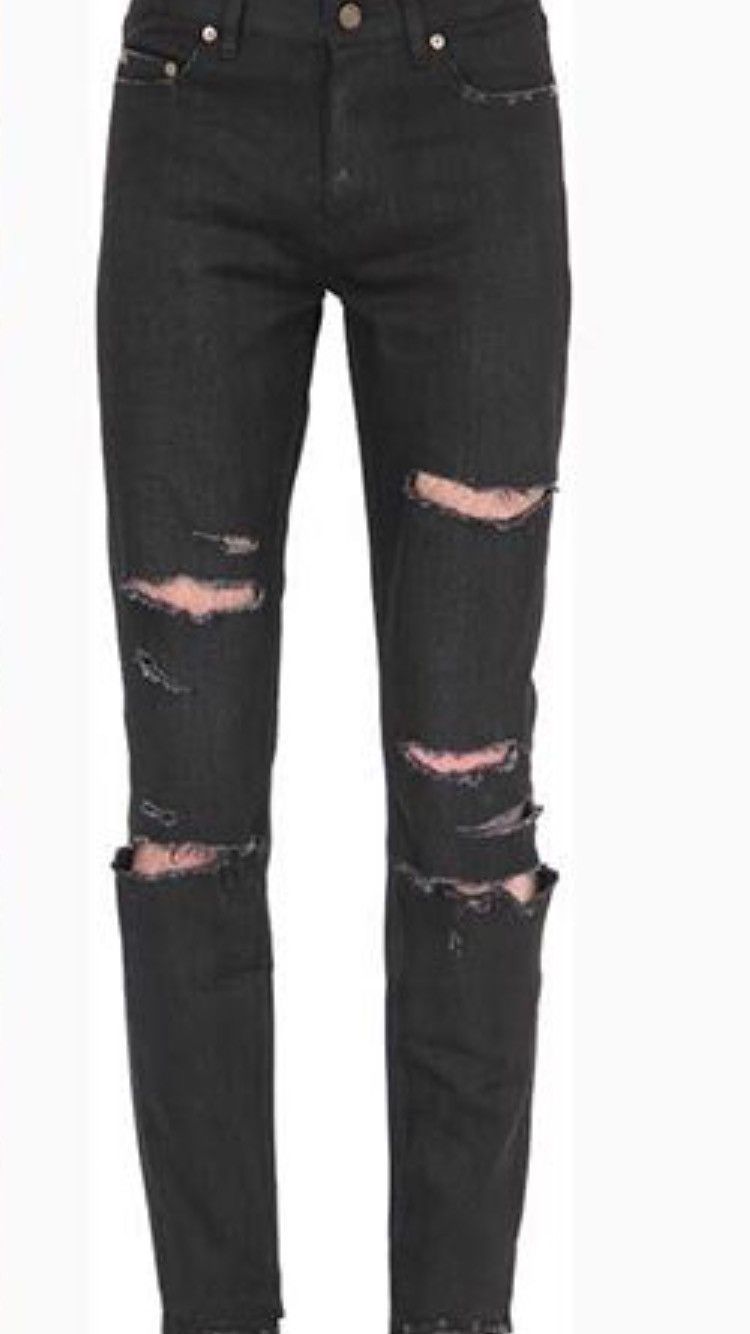 Saint laurent 2025 black distressed jeans