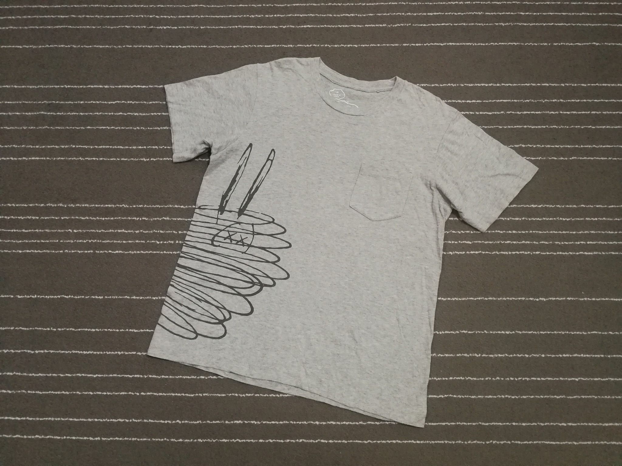 KAWS X PEANUTS X UT SAIZ S