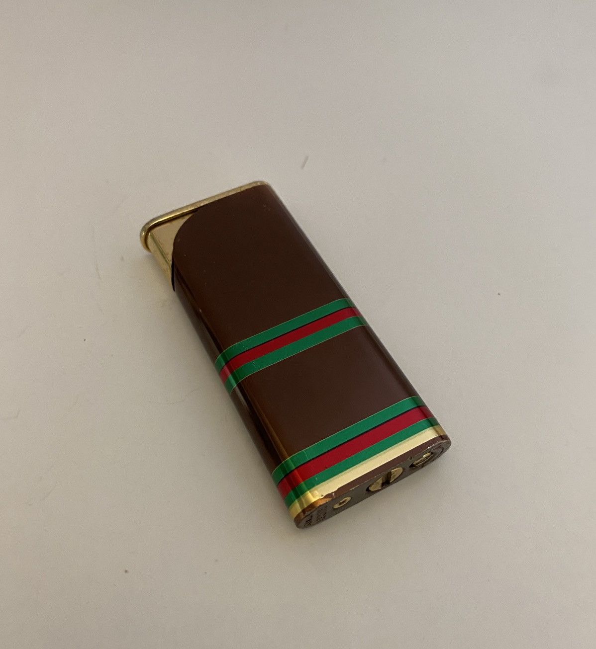 Vintage shops Gucci Rare Designer Lighter Gold Black Green Red