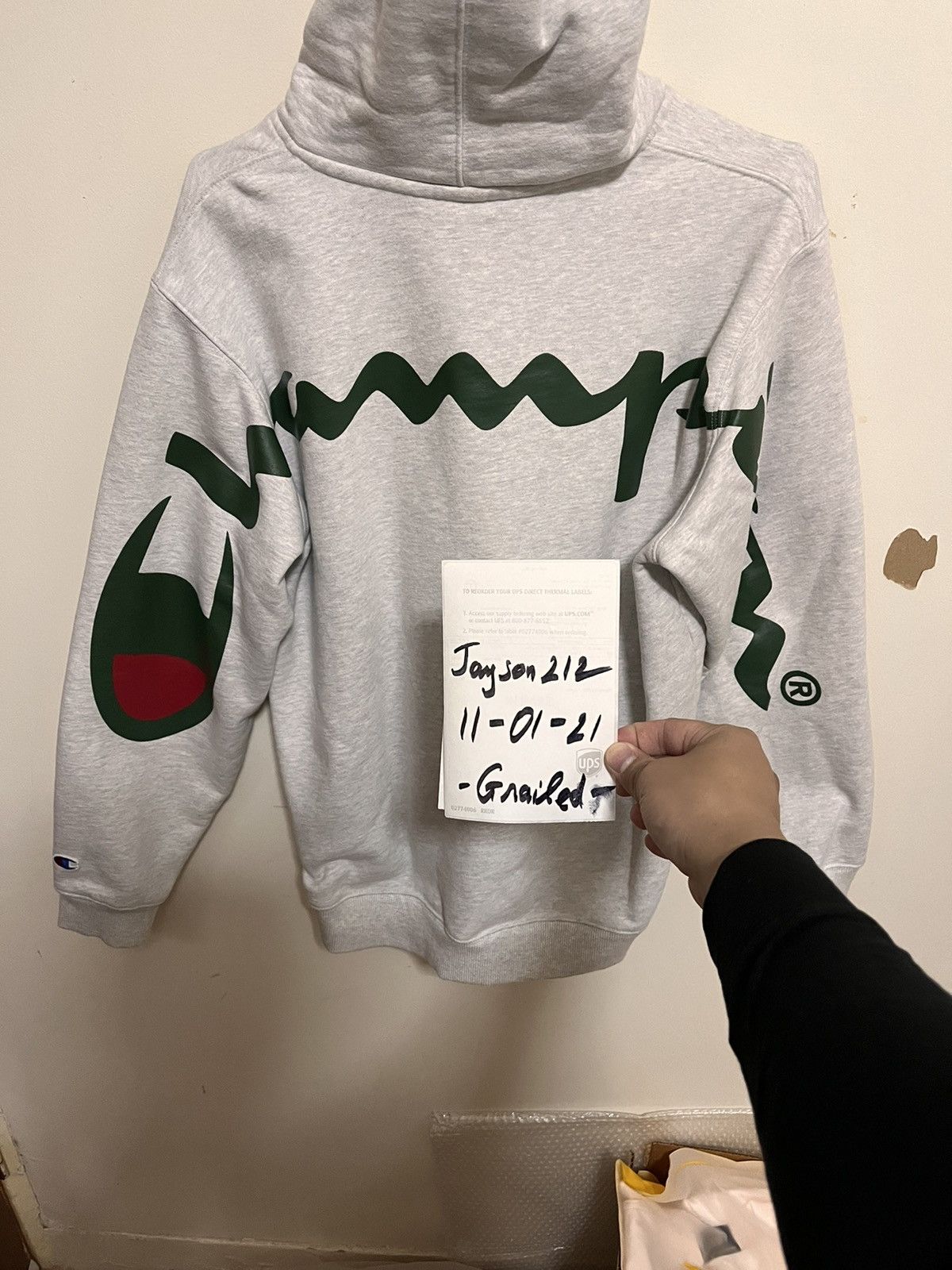 Supreme x hotsell champion hoodie fake