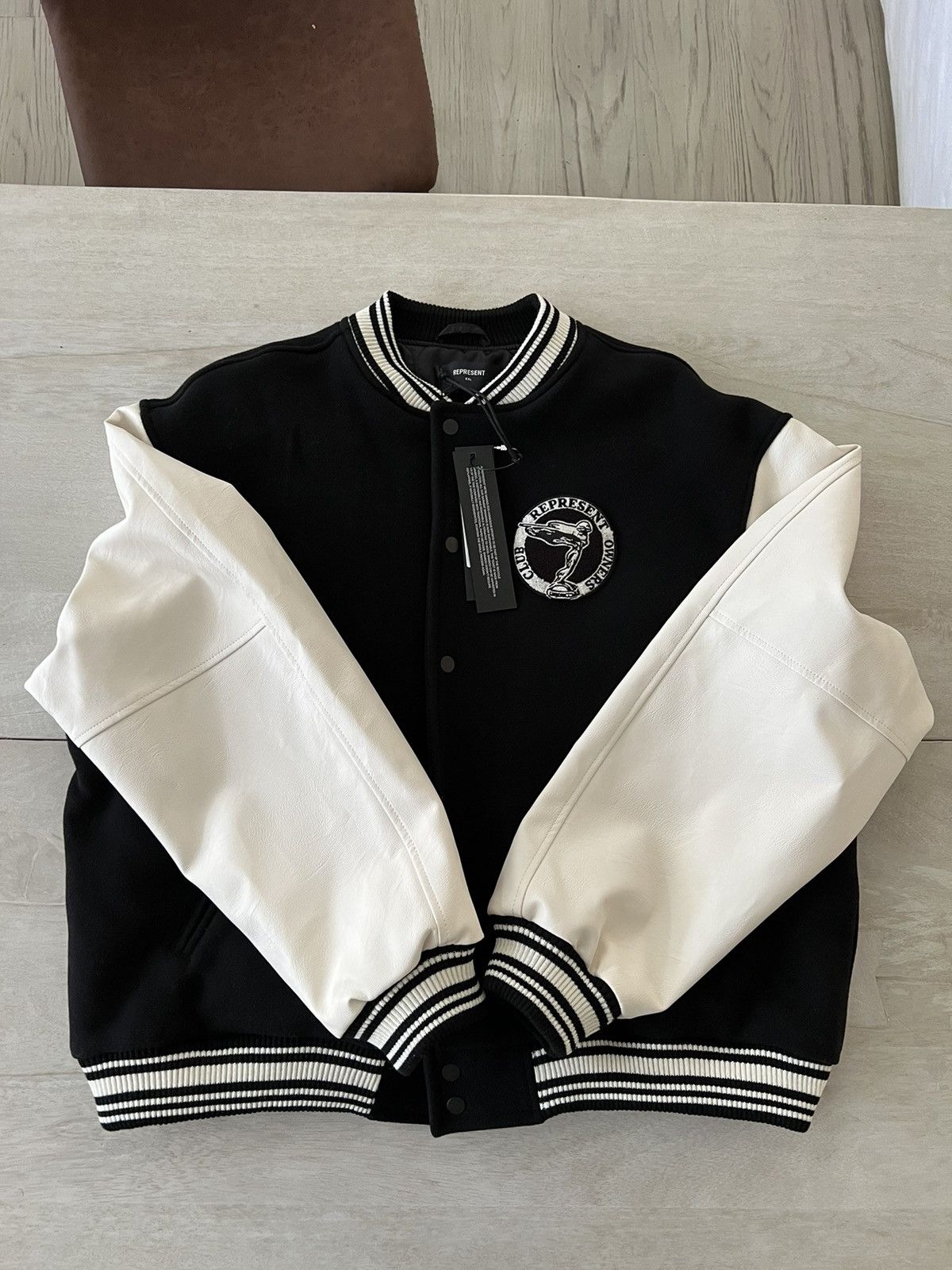 Represent Clo. Represent OWNERS CLUB VARSITY JACKET - BLACK | Grailed