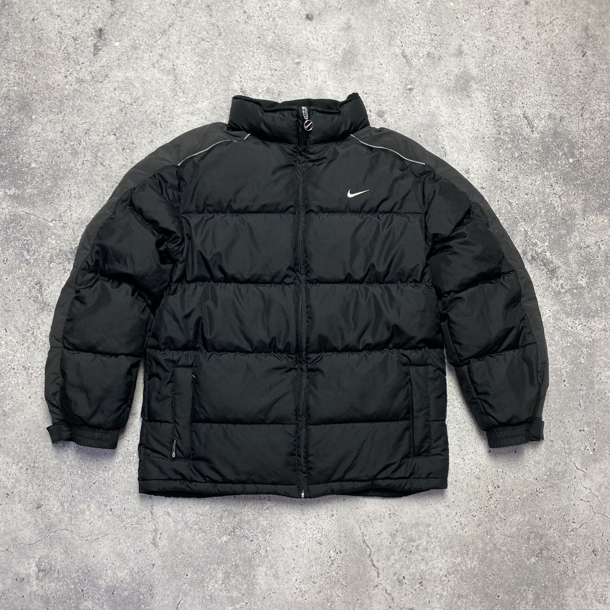 Nike nuptse sales