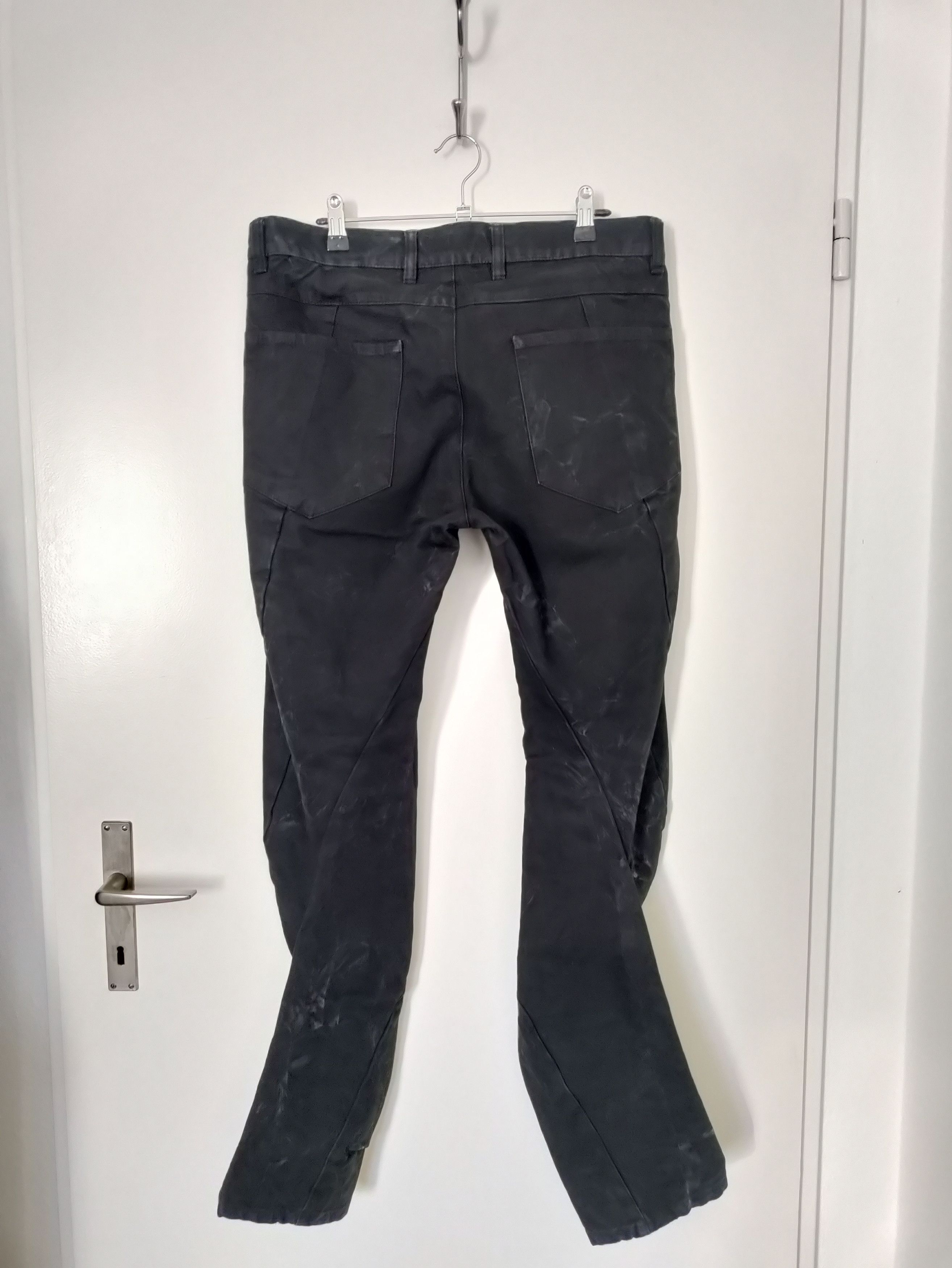 image of Andrea Yaaqov Vinyl Treated, Twisted Leg Denim in Black, Men's (Size 32)