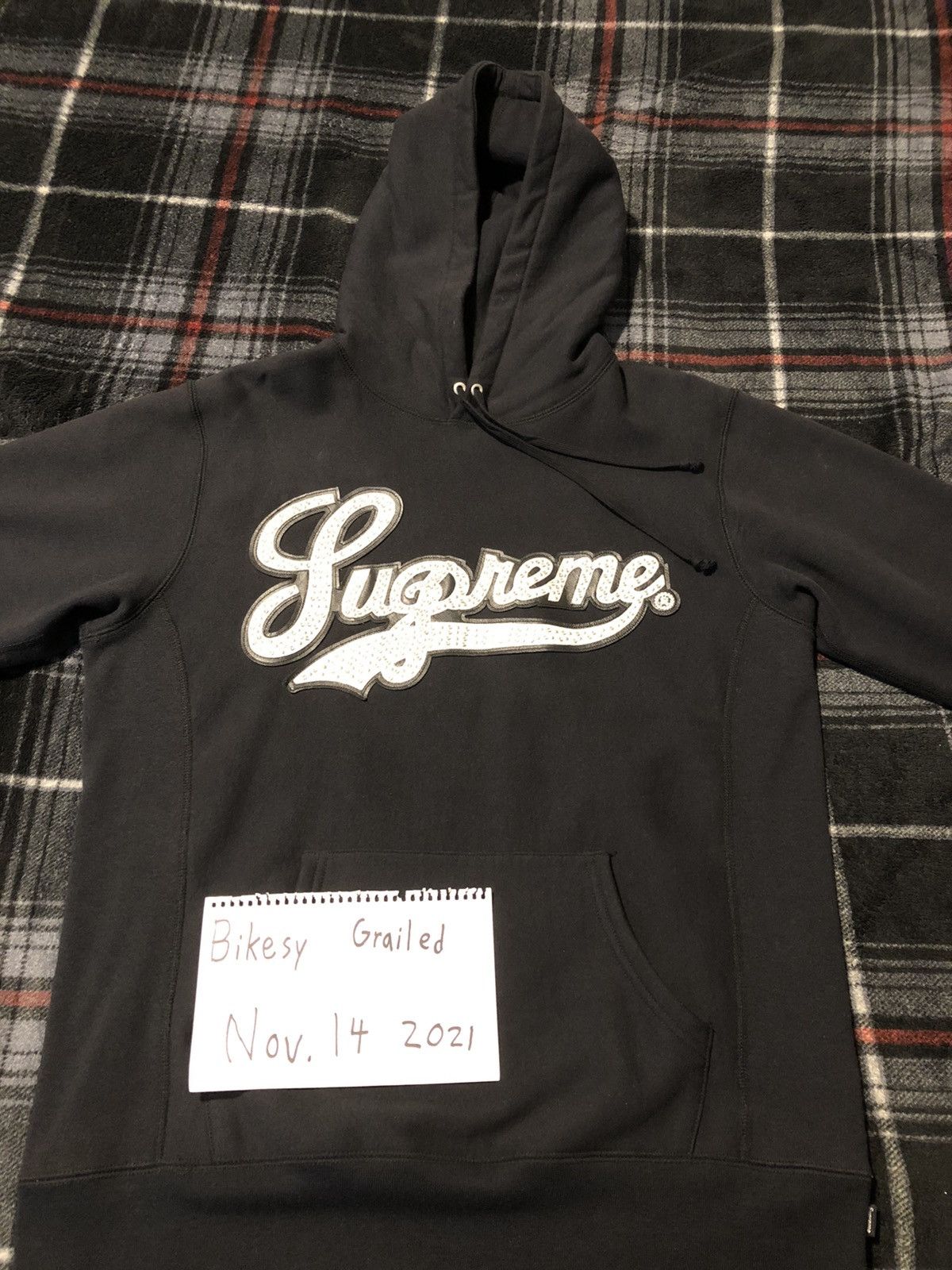 Supreme studded sale leather script hoodie