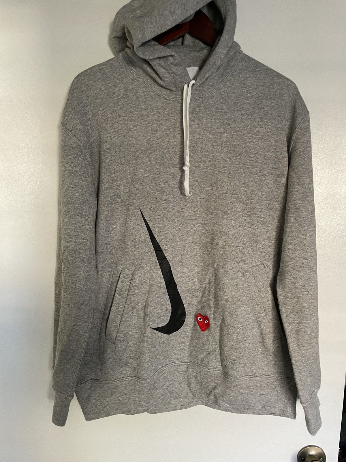 Cdg x nike hoodie hotsell
