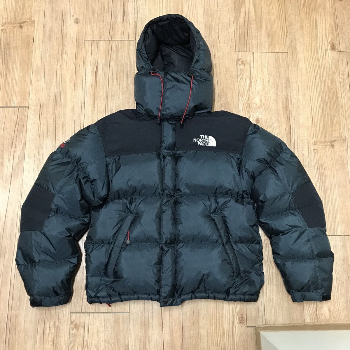 image of The North Face Baltoro 700 Puffer Jacket in Black, Men's (Size Medium)