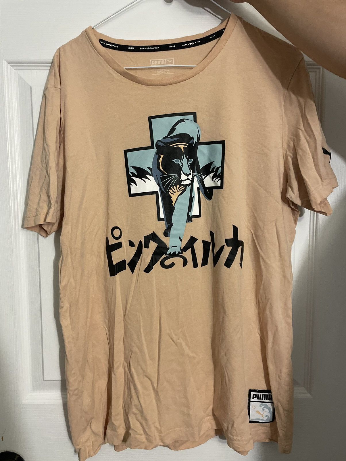 Puma pink dolphin shirt sales