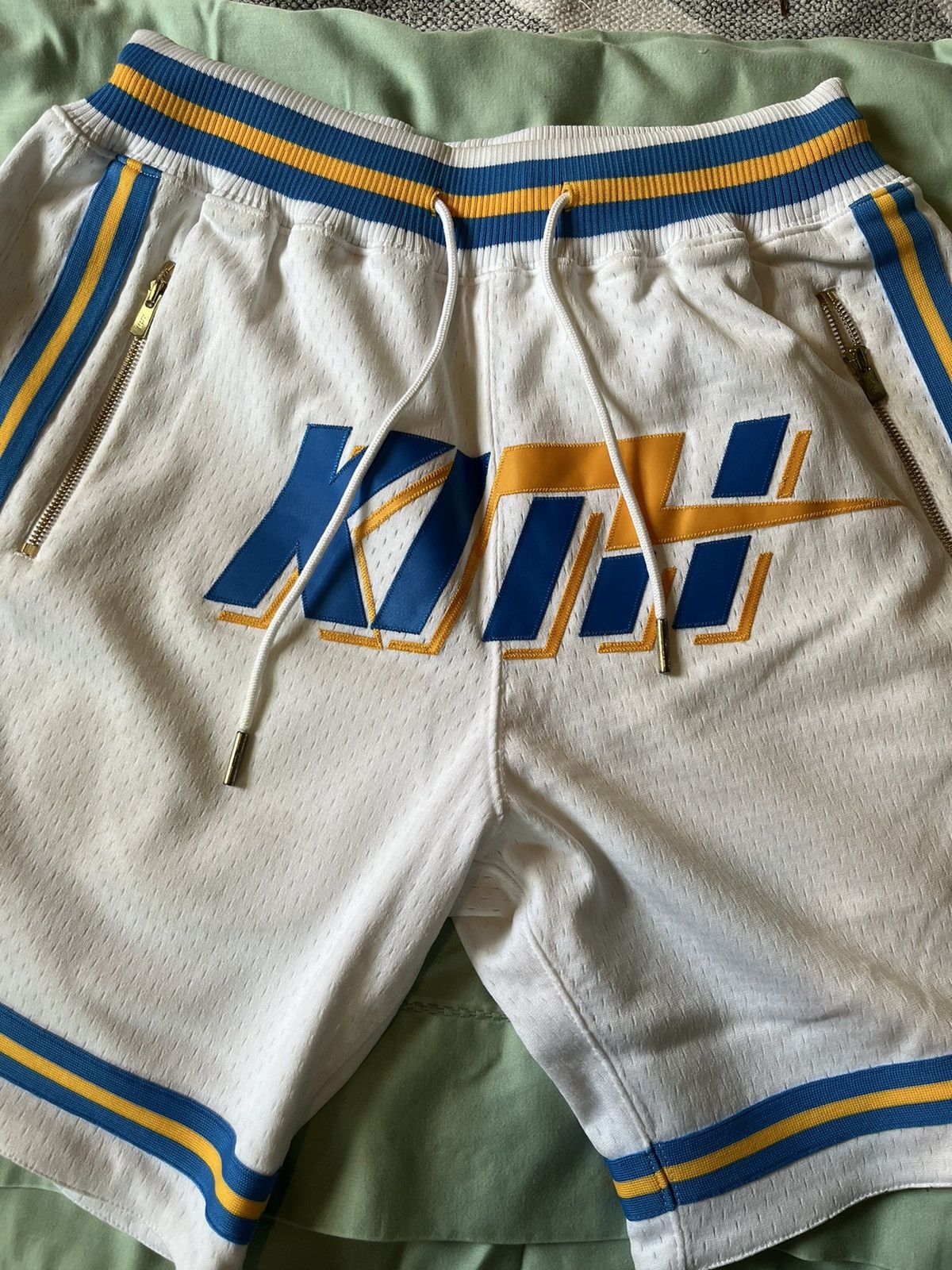 Kith mitchell and ness shorts hotsell