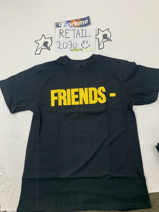 Yellow and store black vlone shirt