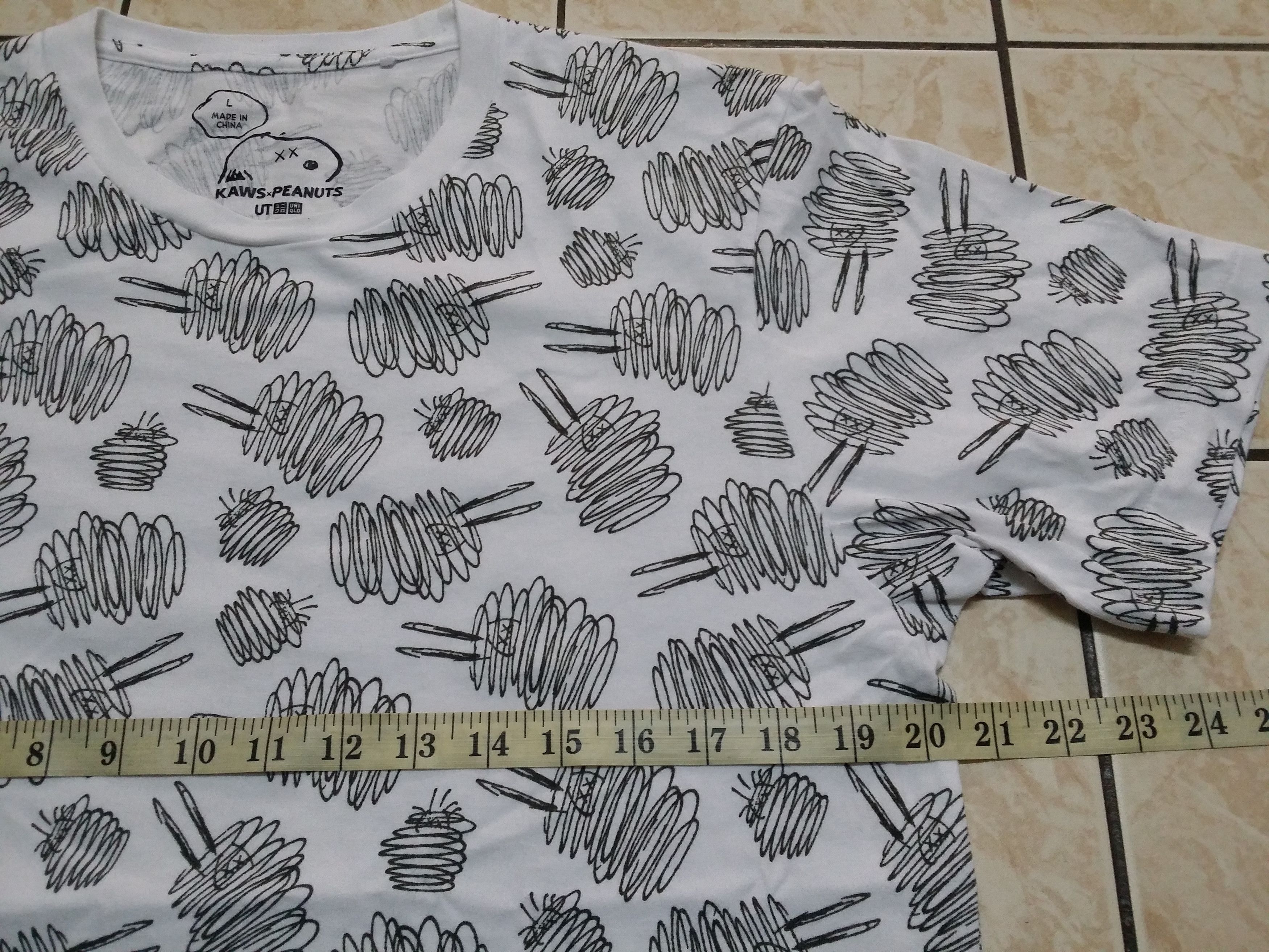 Kaws × Peanuts × Uniqlo Grail🔥Kaws x peanuts x uniqlo fullprint t shirt Size US M / EU 48-50 / 2 - 7 Thumbnail