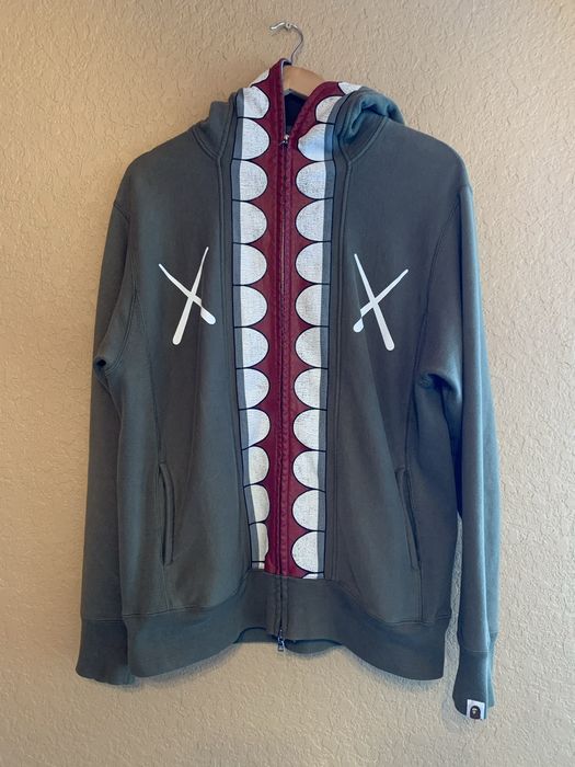 Kaws hotsell chomper hoodie