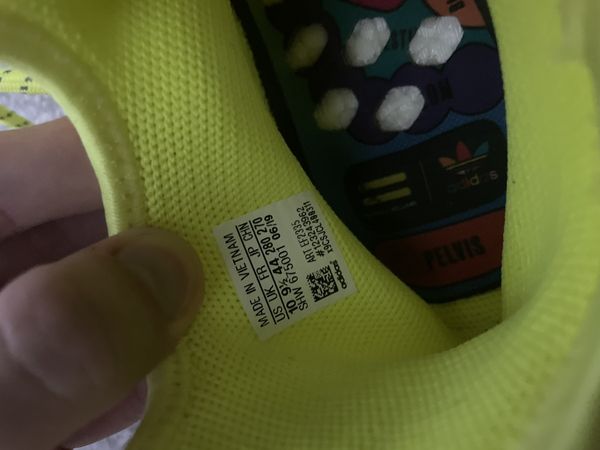 Adidas nmd yellow human race outlet 2019