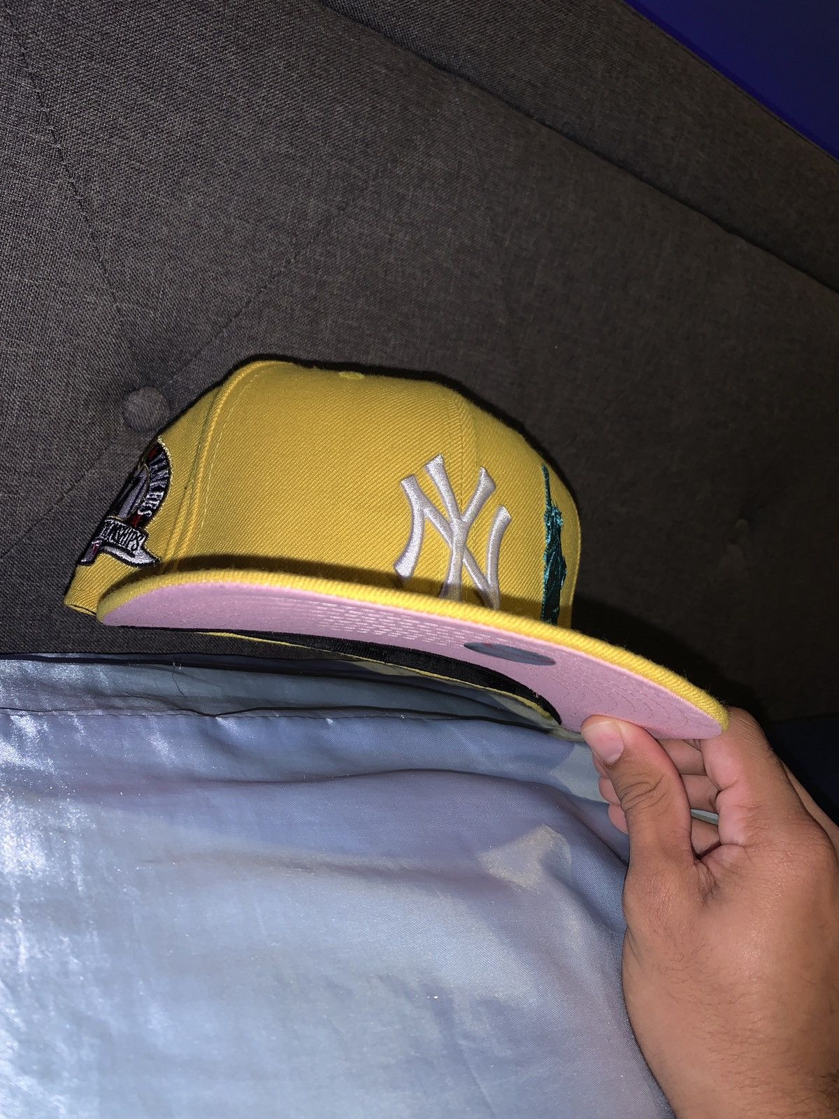Pink brim Yellow Yankees Fitted w/ statue & apple size 7 1/4