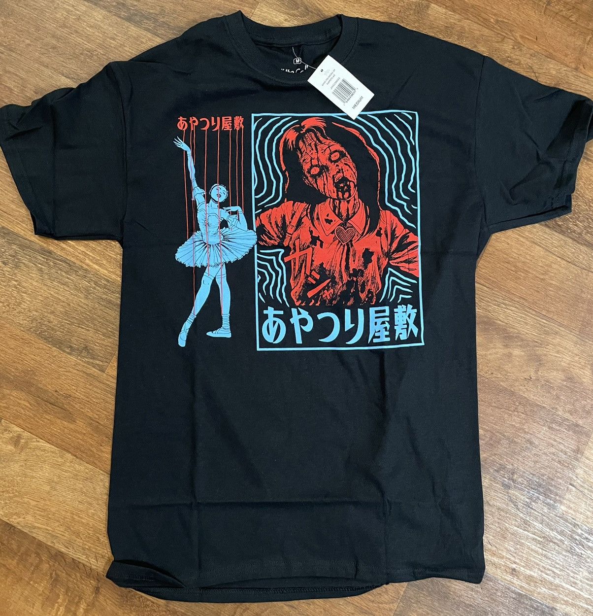 Cartoon Network Authentic Japanese Junji Ito Puppet T-shirt (New) Size US L / EU 52-54 / 3 - 1 Thumbnail