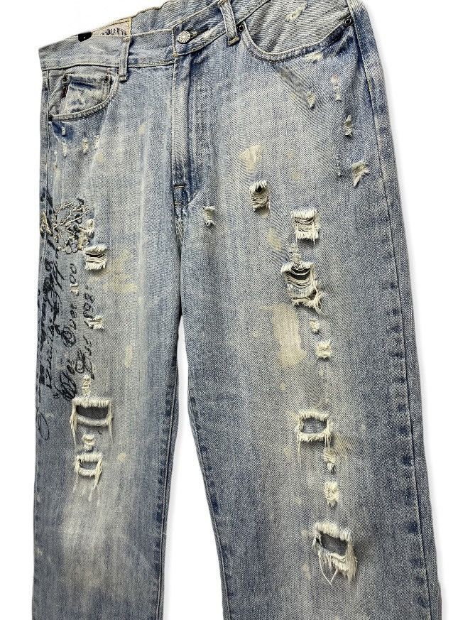 image of Abercrombie Fitch x Distressed Denim Vintage Abercrombie Thrashed Distressed Light Wash Denim in Li